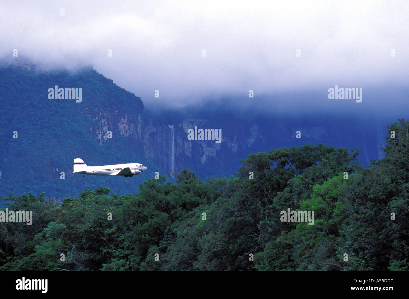 DC3 airplane flying in front of Angel Falls Venezuela Stock Photo - Alamy