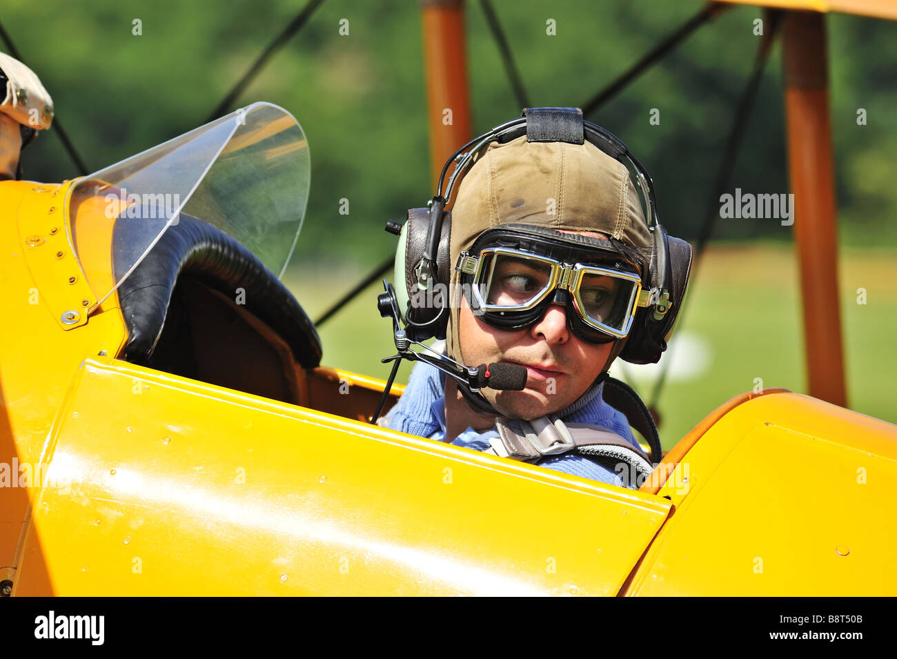 Biplane pilot checks before takeoff Stock Photo - Alamy