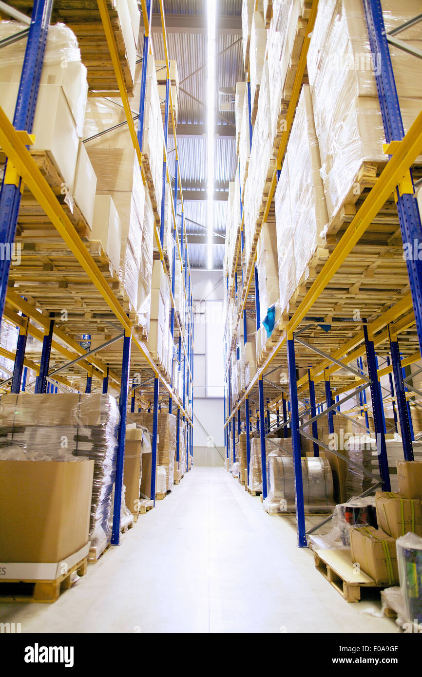 Aisle and shelves in distribution warehouse Stock Photo Alamy